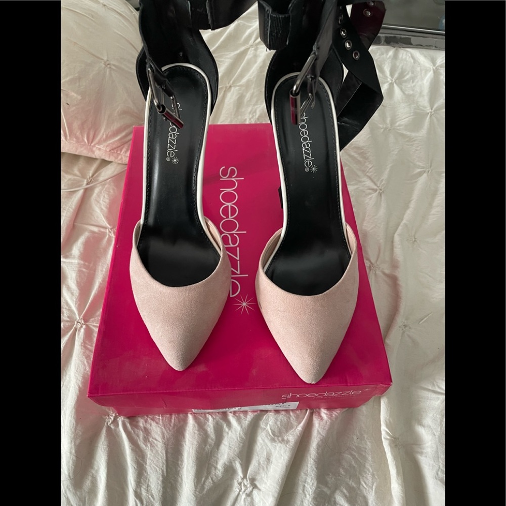 Blush ankle strap pumps.